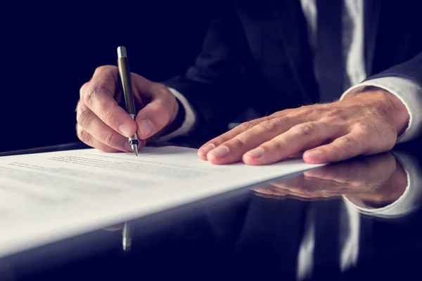 Signing legal document Stock Image