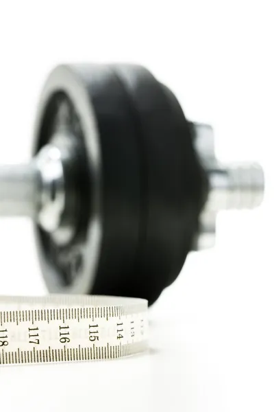 Fita métrica e peso ginásio — Fotografia de Stock