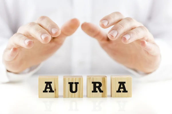 Word - Aura - on wooden cubes — Stock Photo, Image