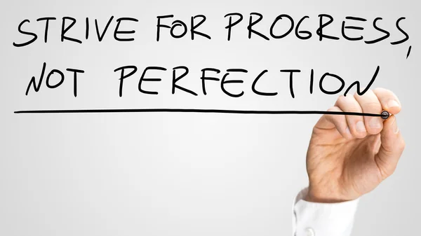 Sträva efter framsteg inte perfektion — Stockfoto