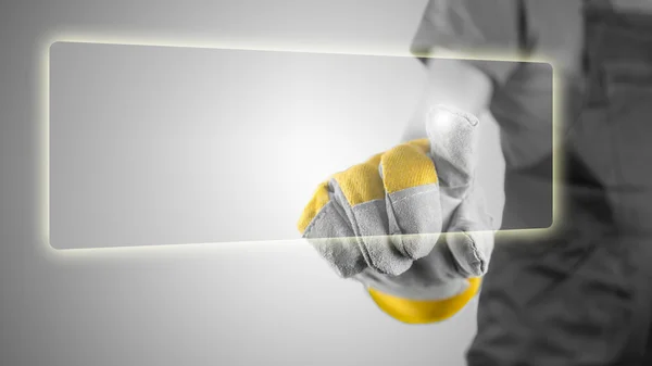 Hand in a workmans glove activing a button — Stock Photo, Image