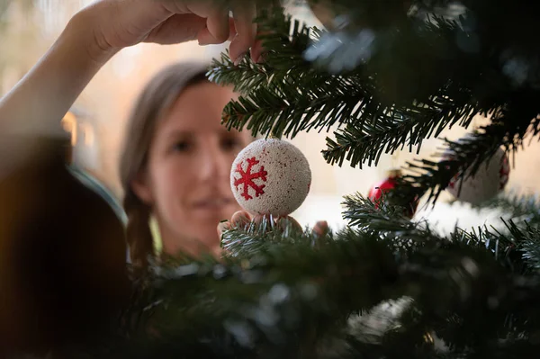 Young Woman Decorating Christmas Tree Hanging Special Holiday Bauble — Stock Photo, Image