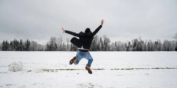 View Successful Young Man Suit Jacket Jumping High Air Snowy — Fotografia de Stock