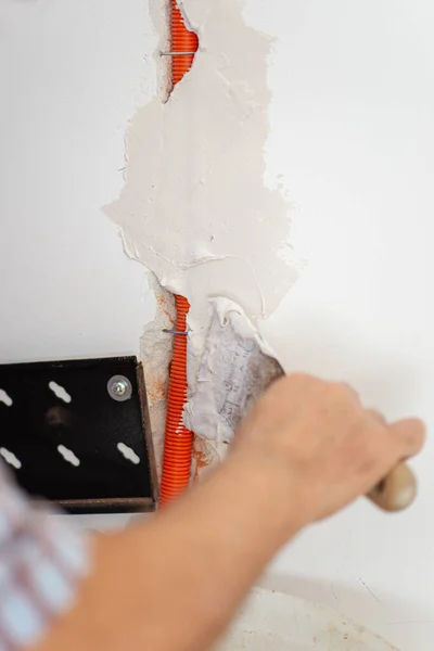 Hand Construction Worker Plastering Orange Corrugated Tube Wall Wiring Installation — Stock Photo, Image