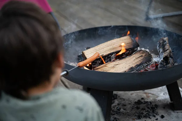 Child Grilling Hotdog Open Fire Cast Iron Grill Domestic Patio — Stock Photo, Image