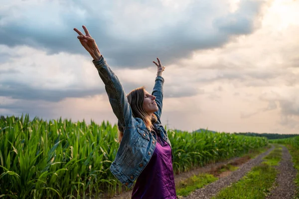 Young Woman Serene Smile Her Face Standing Nature Surrounded Fields — 스톡 사진