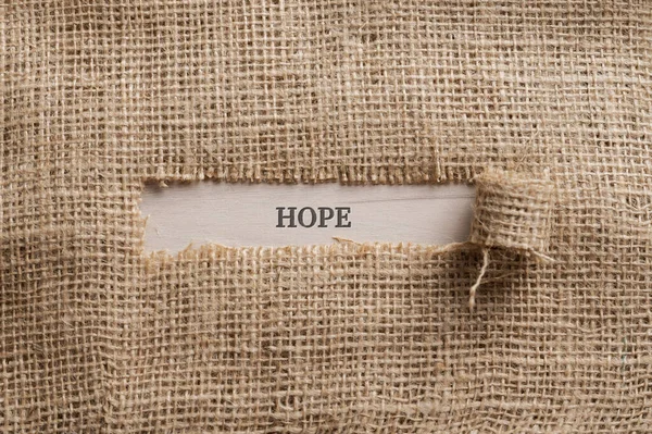 Top View Rough Linen Fabric Torn Window Middle Word Hope — Stock Photo, Image