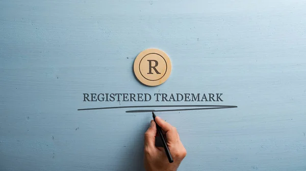 Letter Cut Wooden Cut Circle Male Hand Writing Registered Trademark — Stock Photo, Image
