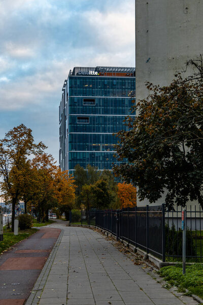 Gdansk, Poland - October 24 2020: Olivia Business Centre building with old block of flat in front of
