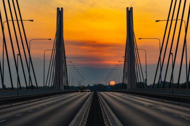 Wroclaw, Poland - July 25 2021: Beautiful morning sunrise seen over millennium bridge