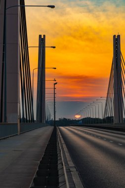Wroclaw, Poland - July 25 2021: Beautiful morning sunrise seen over millennium bridge