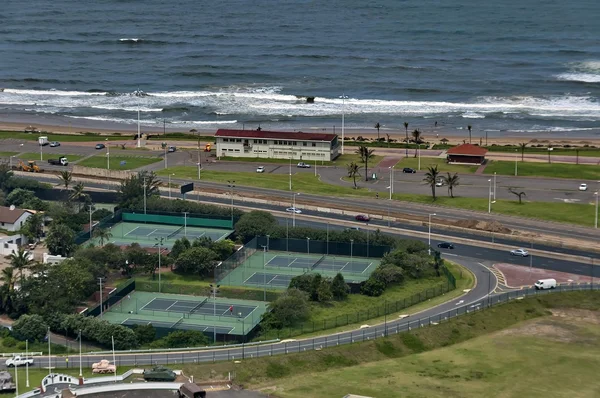 Several tennis court by seaside in Durban city — Stock Photo, Image