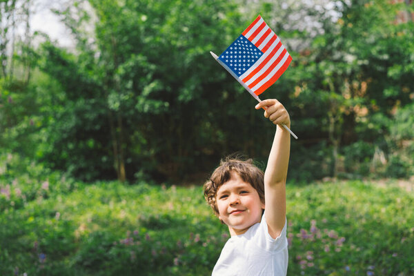 Happy Little Patriotic Boy Holding American Flag Usa Celebrate 4Th Stock Picture