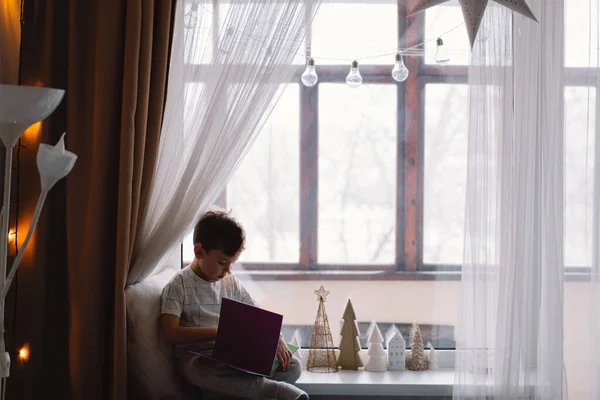 Cute Boy Reading Book Sitting Windowsill Window Cozy Home Decorative — Foto de Stock