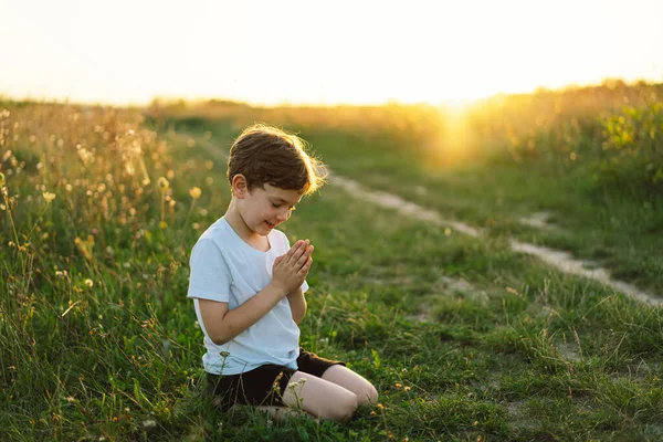 Boy Closed Her Eyes Praying Field Sunset Hands Folded Prayer Stock Picture