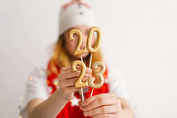 Funny Young Girl New Years Hat Red Scarf Holds Numbers Stock Image