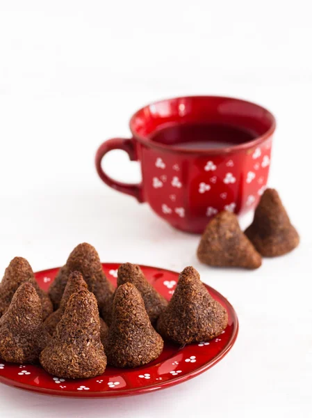 Chocolate candies and tea — Stock Photo, Image