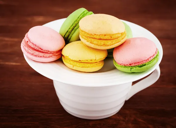 Macarons on the cup — Stock Photo, Image