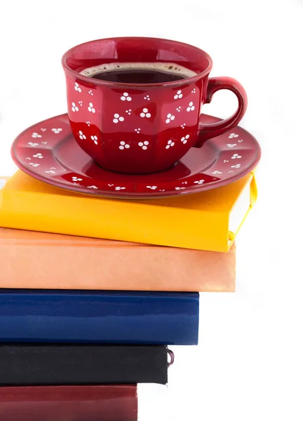 Tasse de café sur pile de livres — Photo