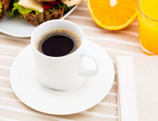 Breakfast with sandwich, coffee and orange juice — Stock Photo, Image