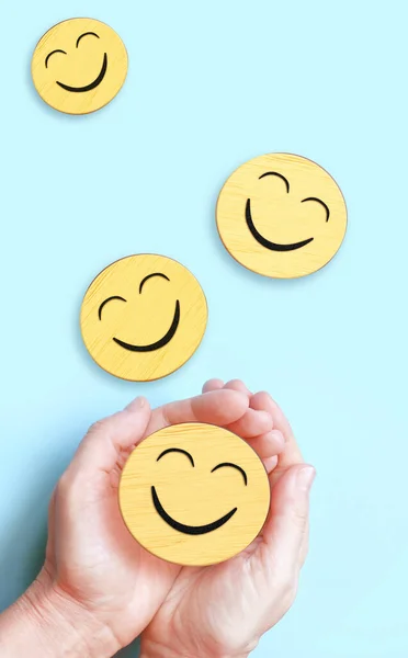 Hand Holding Happy Smile Face Blue Background Positive Thinking Mental — Fotografia de Stock