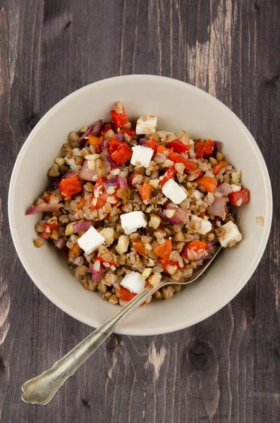 Buckwheat salad with roasted peppers and feta — Stock Photo, Image