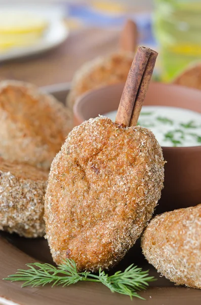 Chicken cutlets on a stick of cinnamon — Stock Photo, Image