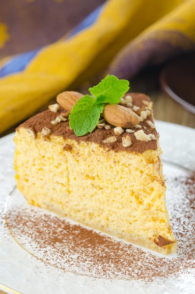 A piece of pumpkin cheesecake close up vertical — Stock Photo, Image