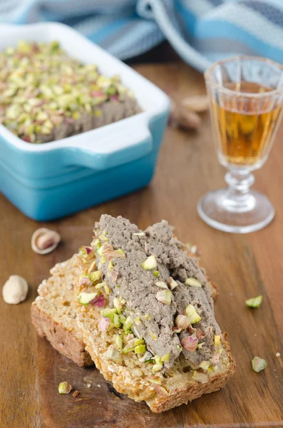 Slice of bread with chicken liver pate with pistachios — Stock Photo, Image