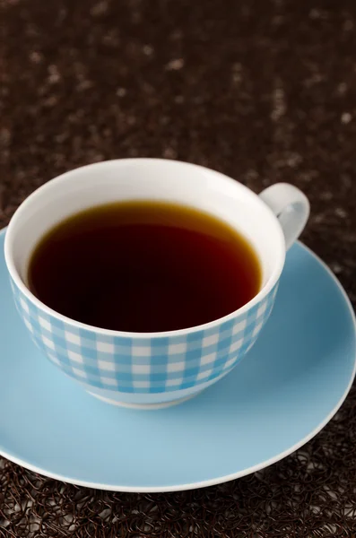 Una taza de té negro —  Fotos de Stock