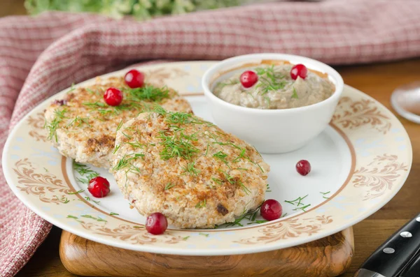 Chicken cutlets with cowberry and mushroom sauce — Stock Photo, Image