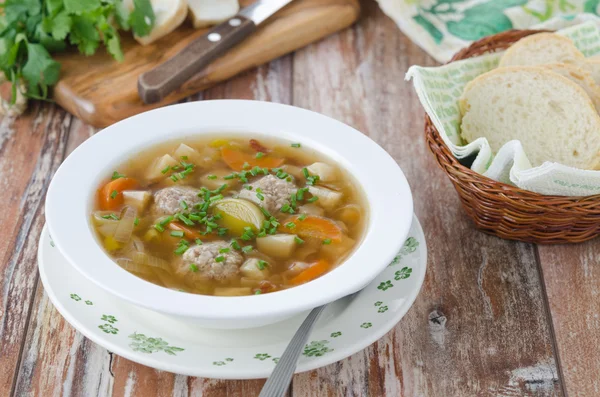 Plate of vegetable soup with meatballs — Stock Photo, Image