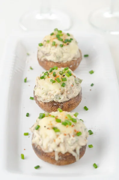 Stuffed mushrooms, baked with cheese and herbs — Stock Photo, Image