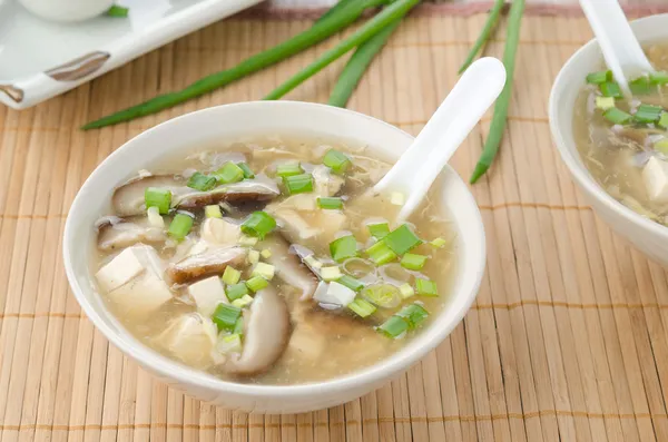 Chinese spicy soup with egg, shiitake mushrooms, tofu — Stock Photo, Image