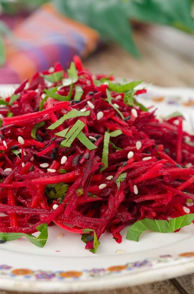 Salad of fresh beets and carrots with parsley closeup — Stock Photo, Image