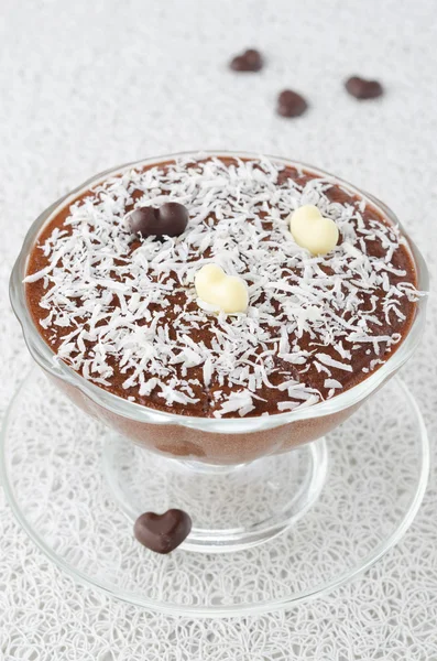 Chocolate mousse with chocolate hearts decorated with coconut — Stock Photo, Image