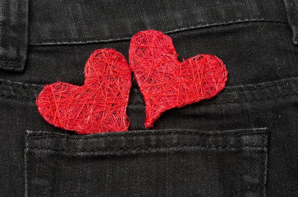 Dos corazones rojos en un bolsillo —  Fotos de Stock