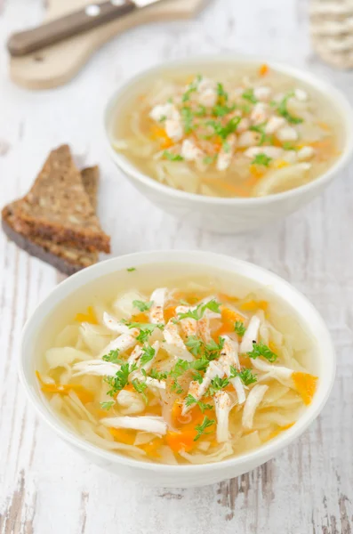 Vegetable soup with chicken, cabbage and parsley — Stock Photo, Image