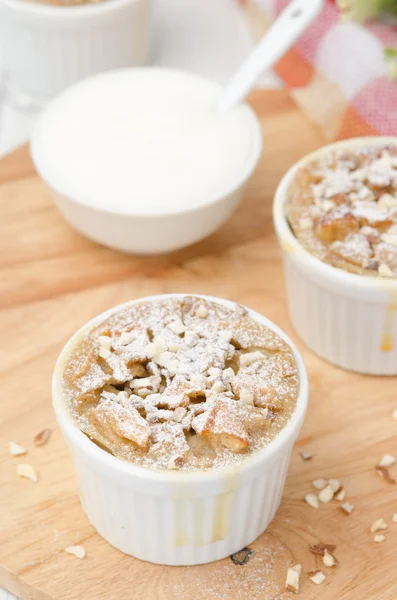 Apple cake with nuts in a white ramekin top view — Stock Photo, Image