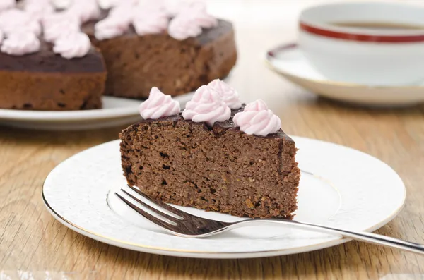 piece of chocolate cake with nuts horizontal