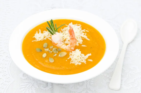 Pumpkin soup with shrimp and parmesan cheese — Stock Photo, Image