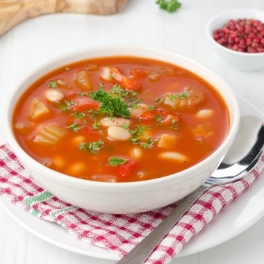 roasted tomato soup with beans, celery and sweet pepper clipart