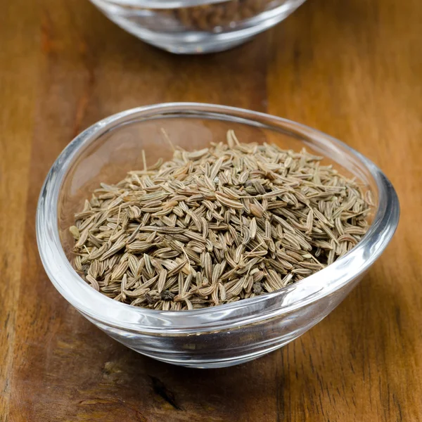 Cumin in a glass bowl — Stock Photo, Image