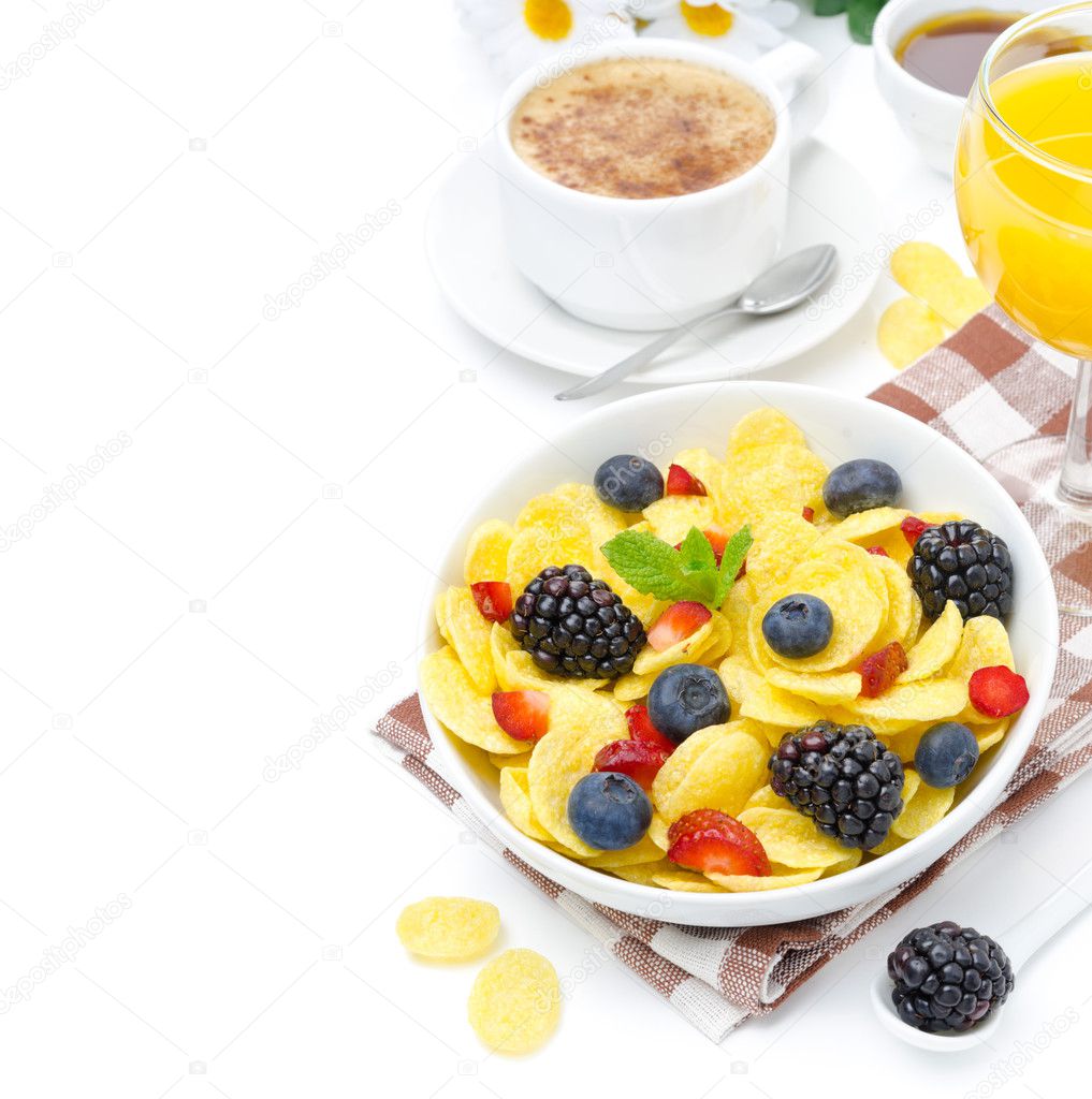 Cornflakes, fresh berries, cup of cappuccino and orange juice