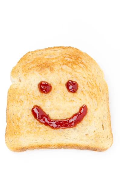 Toast with a smile of jam isolated on white — Stock Photo, Image
