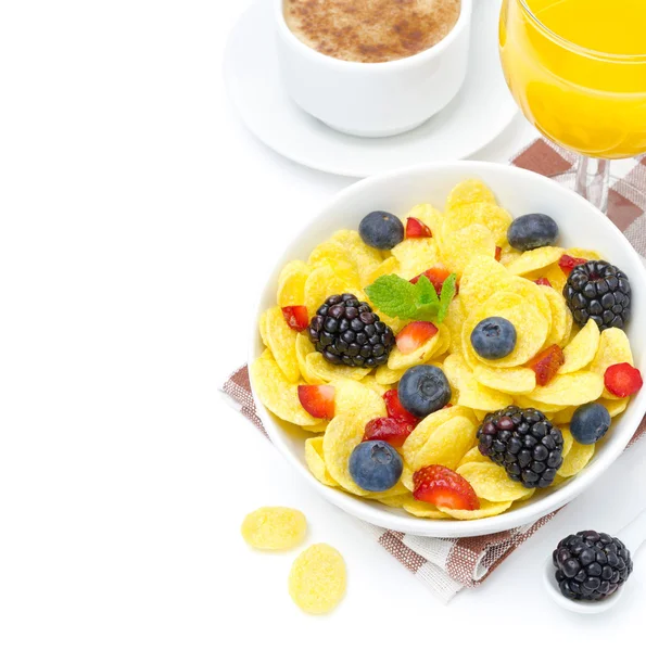 Cornflakes, baies fraîches, tasse de cappuccino et jus d'orange — Photo