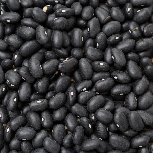 Фон из чёрных бобов — стоковое фото