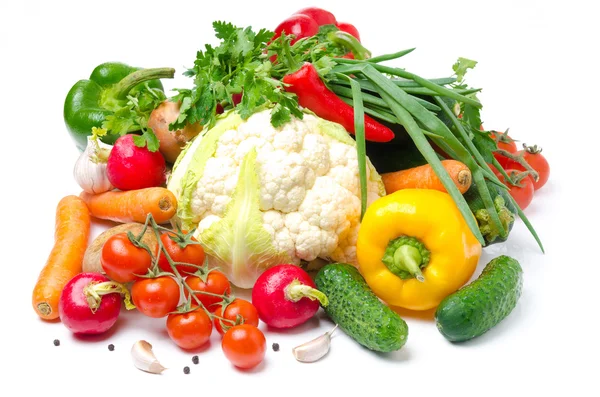 Assorted fresh vegetables and greens on a white background — Stock Photo, Image