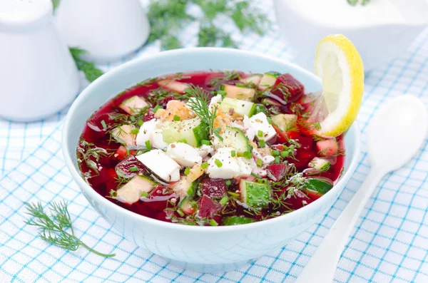 Cold beetroot soup with cucumbers, eggs and herbs — Stock Photo, Image