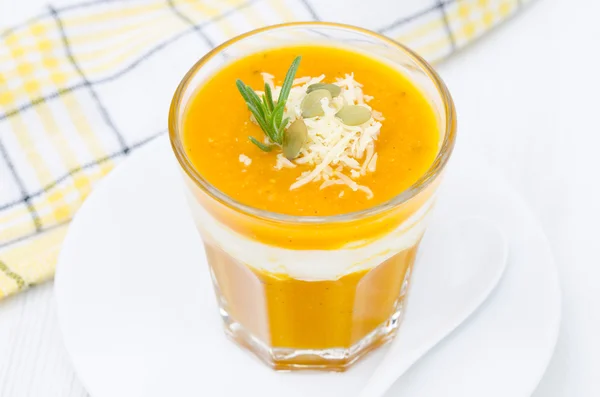 Pumpkin soup with shrimp, yogurt and rosemary in a glass — Stock Photo, Image